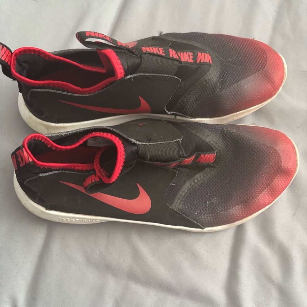Nike Kids Black and Red Slip-On Sneakers